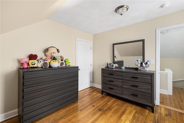 2 Palfrey Pl, Providence, RI 02909 - bedroom featuring wood finished floors and vaulted ceiling