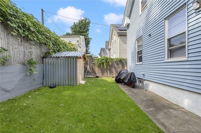 2 Palfrey Pl, Providence, RI 02909 - fenced backyard featuring a storage unit