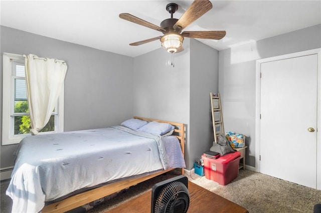 598 Laurel Hill Ave, Cranston, RI 02920 - carpeted bedroom featuring a ceiling fan