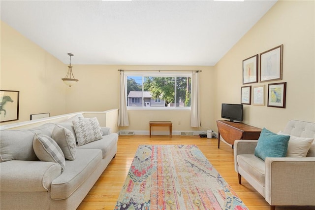104 Conanicus Rd, Narragansett, RI 02882 - living room featuring light wood finished floors and vaulted ceiling