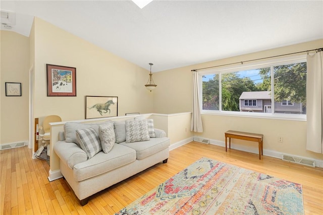 104 Conanicus Rd, Narragansett, RI 02882 - living area with wood finished floors and lofted ceiling
