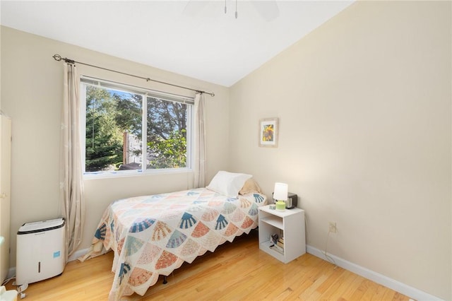104 Conanicus Rd, Narragansett, RI 02882 - bedroom featuring light wood-type flooring, lofted ceiling, and a ceiling fan