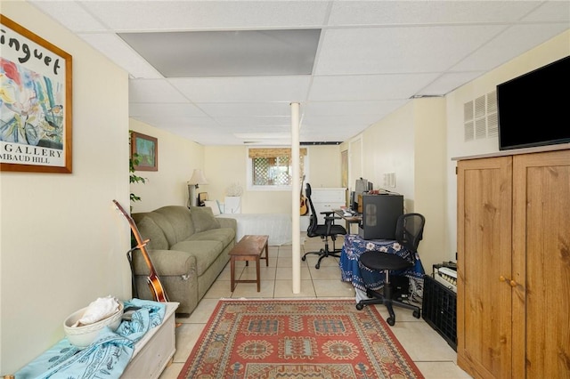 104 Conanicus Rd, Narragansett, RI 02882 - living room featuring a drop ceiling, light tile patterned flooring, and an office area