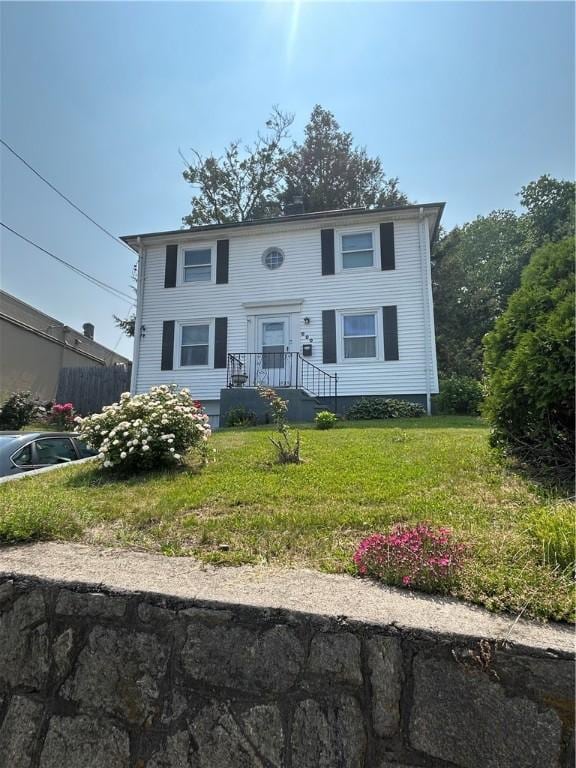 690 Killingly St, Johnston, RI 02919 - colonial-style house with a front lawn