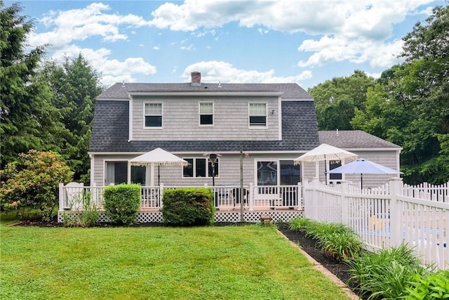 5 Havens Rd, Westerly, RI 02891 - rear view of property featuring a wooden deck, a chimney, a gambrel roof, and a shingled roof