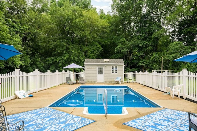 5 Havens Rd, Westerly, RI 02891 - view of swimming pool with a patio, an outbuilding, and view of wooded area