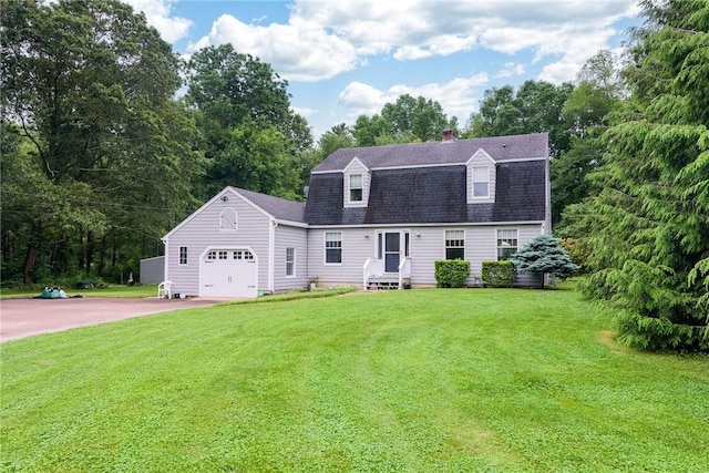 5 Havens Rd, Westerly, RI 02891 - back of house with a garage, driveway, a shingled roof, a chimney, and a lawn