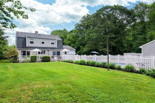 5 Havens Rd, Westerly, RI 02891 - back of house featuring a gambrel roof, a chimney, and a deck
