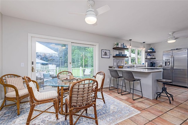 5 Havens Rd, Westerly, RI 02891 - dining area with a ceiling fan, plenty of natural light, and light tile patterned floors