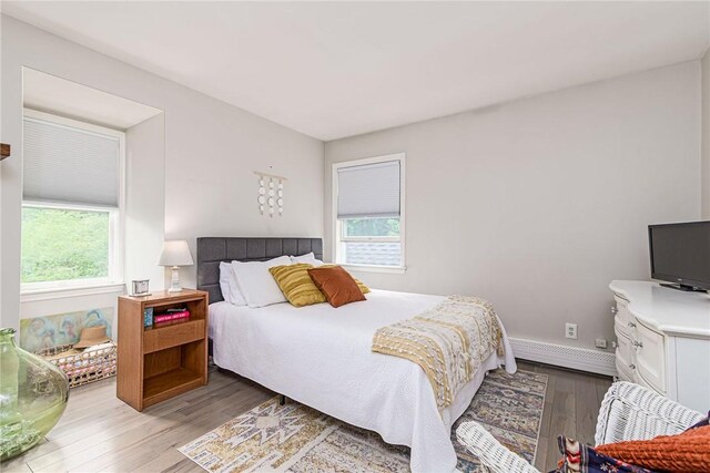 5 Havens Rd, Westerly, RI 02891 - bedroom with wood finished floors and a baseboard radiator