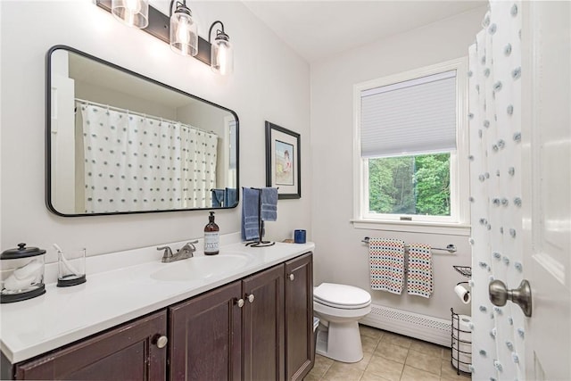 5 Havens Rd, Westerly, RI 02891 - bathroom with baseboard heating, vanity, and tile patterned flooring