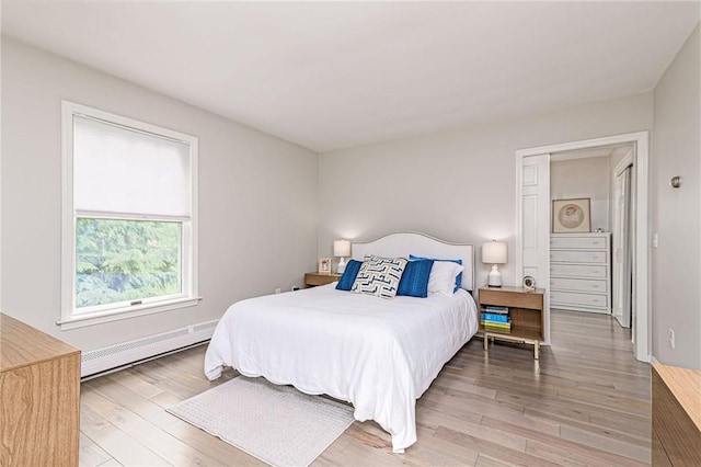 5 Havens Rd, Westerly, RI 02891 - bedroom with baseboard heating and light wood-type flooring