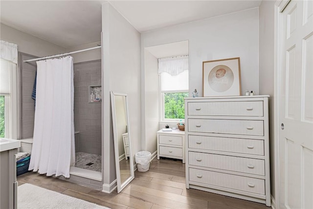 5 Havens Rd, Westerly, RI 02891 - full bathroom with vanity, wood finished floors, and a stall shower