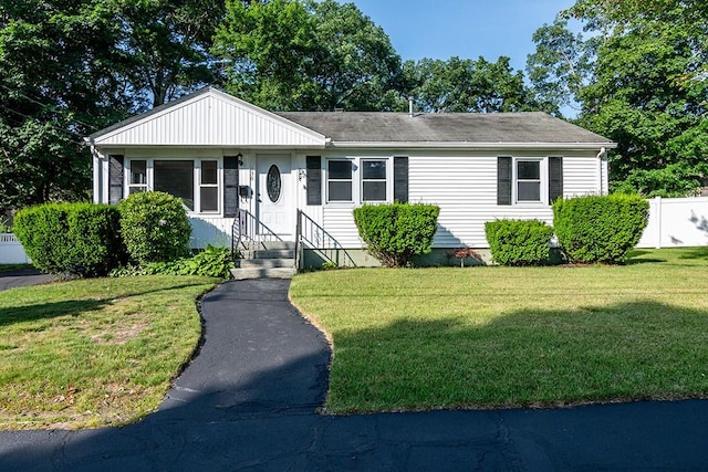 136 Davis Ave, Cranston, RI 02910 - view of front facade with a front lawn