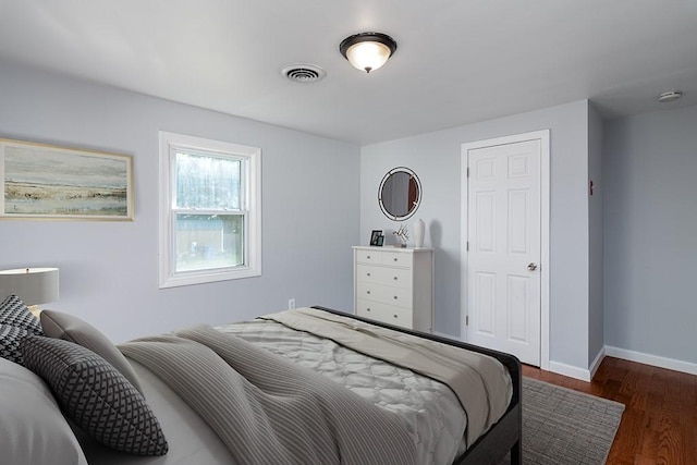 136 Davis Ave, Cranston, RI 02910 - bedroom with dark wood-style floors and baseboards