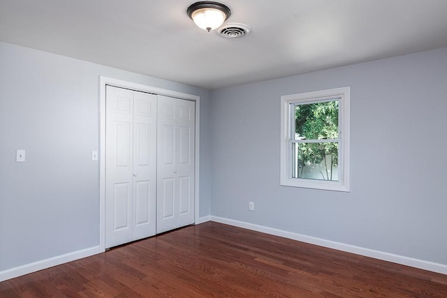 136 Davis Ave, Cranston, RI 02910 - unfurnished bedroom featuring dark wood-type flooring and a closet