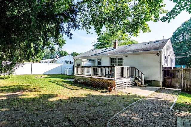 136 Davis Ave, Cranston, RI 02910 - back of house with a deck, a chimney, and a fenced backyard