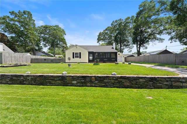 320 Miantonomo Dr, Warwick, RI 02888 - rear view of house with a fenced backyard