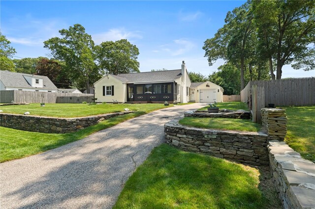 320 Miantonomo Dr, Warwick, RI 02888 - bungalow-style house featuring asphalt driveway, an outdoor structure, a chimney, and a garage