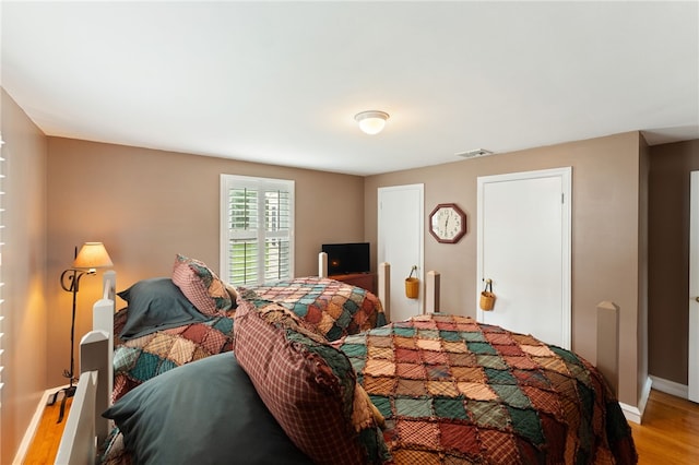 320 Miantonomo Dr, Warwick, RI 02888 - bedroom featuring wood finished floors and baseboards