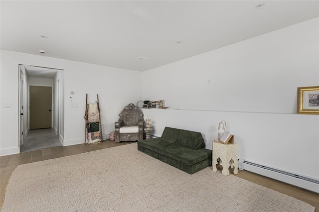193 Mohawk Trl, Cranston, RI 02921 - sitting room featuring baseboard heating and wood finished floors