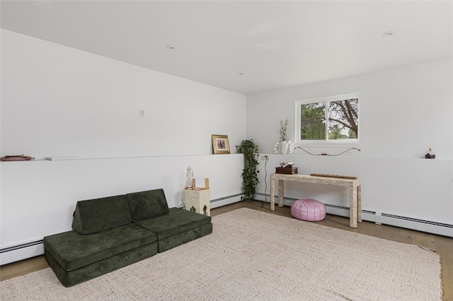 193 Mohawk Trl, Cranston, RI 02921 - living area featuring wood finished floors and a baseboard radiator