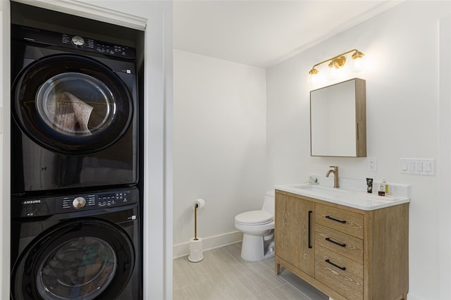 193 Mohawk Trl, Cranston, RI 02921 - bathroom featuring stacked washing machine and dryer and vanity