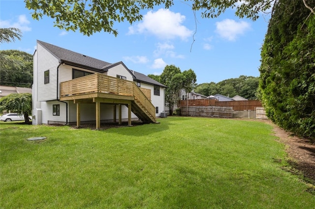 193 Mohawk Trl, Cranston, RI 02921 - rear view of house with stairs and a wooden deck