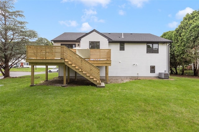 193 Mohawk Trl, Cranston, RI 02921 - rear view of house featuring stairs, a wooden deck, a lawn, and roof with shingles