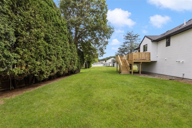 193 Mohawk Trl, Cranston, RI 02921 - view of green lawn featuring stairway and a wooden deck