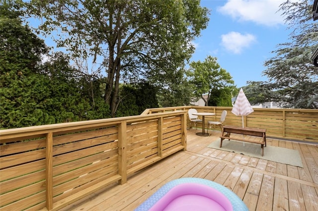 193 Mohawk Trl, Cranston, RI 02921 - wooden terrace with outdoor dining area