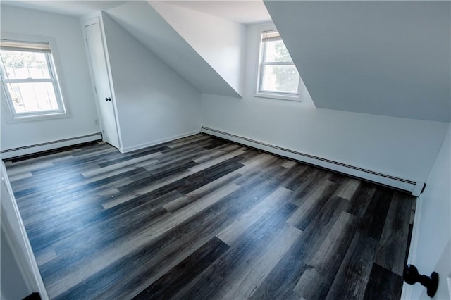 25 Unit St, Providence, RI 02909 - additional living space featuring baseboard heating, wood finished floors, and vaulted ceiling