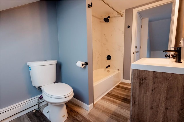 25 Unit St, Providence, RI 02909 - bathroom featuring baseboard heating, vanity,  shower combination, and wood finished floors