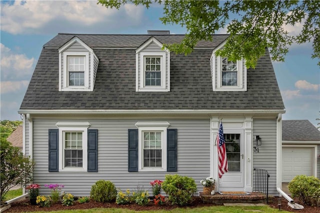 31 Bowen St, East Providence, RI 02916 - colonial inspired home with roof with shingles and an attached garage