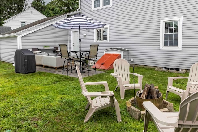 31 Bowen St, East Providence, RI 02916 - view of grassy yard with a patio and an outdoor living space with a fire pit