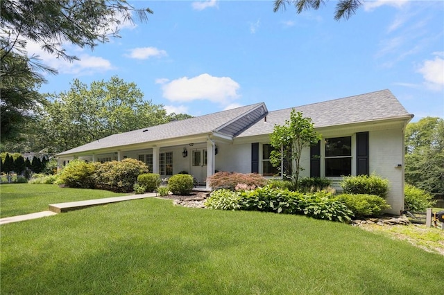 469 Fletcher Rd, North Kingstown, RI 02852 - ranch-style house featuring a front lawn and roof with shingles