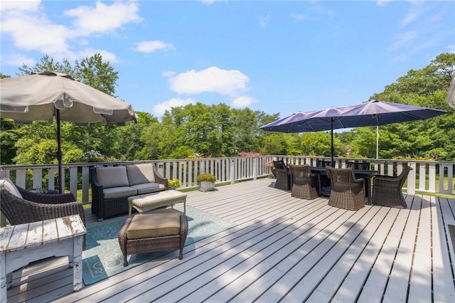 469 Fletcher Rd, North Kingstown, RI 02852 - wooden deck featuring an outdoor living space and outdoor dining space