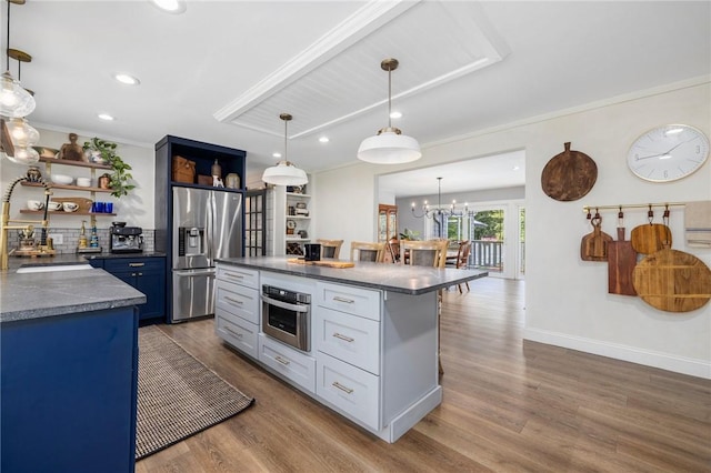 469 Fletcher Rd, North Kingstown, RI 02852 - kitchen with appliances with stainless steel finishes, open shelves, wood finished floors, crown molding, and recessed lighting