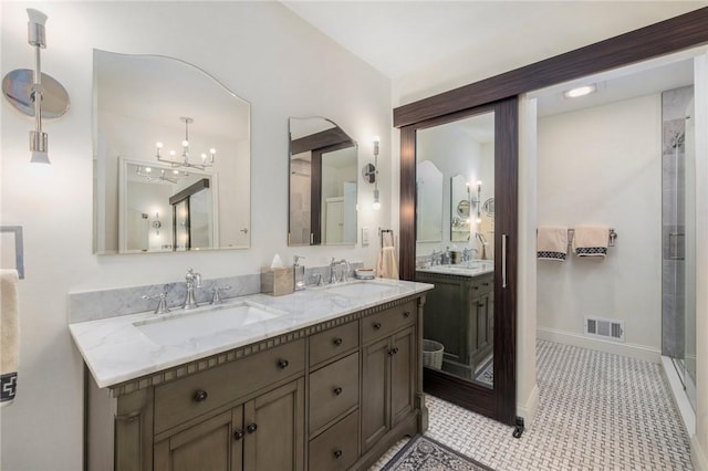 469 Fletcher Rd, North Kingstown, RI 02852 - full bath featuring double vanity, a chandelier, and a shower