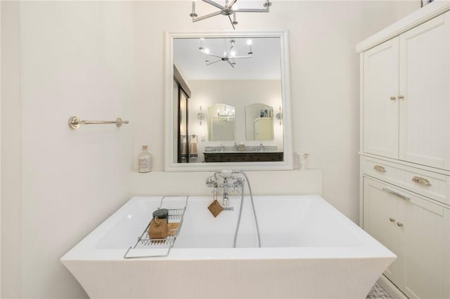 469 Fletcher Rd, North Kingstown, RI 02852 - full bathroom with a freestanding bath and a chandelier