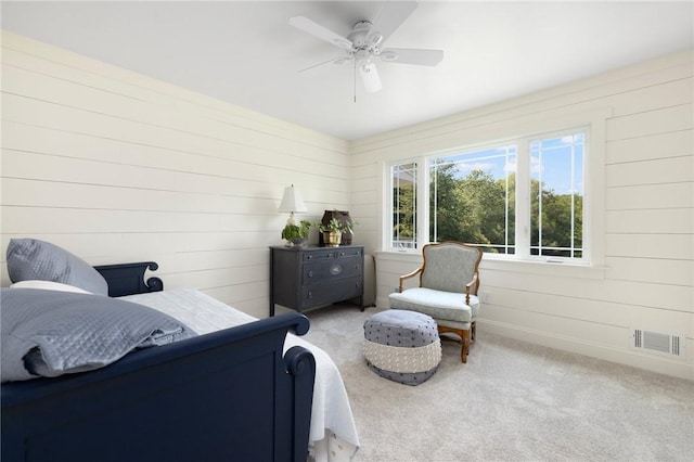 469 Fletcher Rd, North Kingstown, RI 02852 - carpeted bedroom featuring wooden walls and ceiling fan