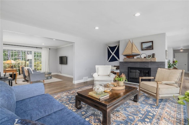 469 Fletcher Rd, North Kingstown, RI 02852 - living area featuring wood finished floors, a fireplace, and recessed lighting