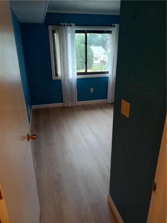 510 Child St Unit 106C, Warren, RI 02885 - empty room featuring wood finished floors and baseboards