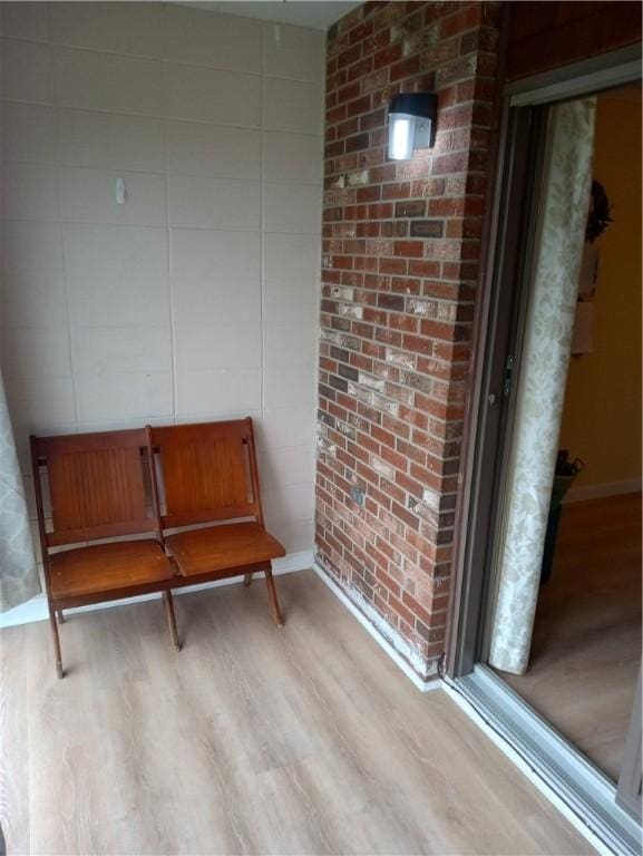 510 Child St Unit 106C, Warren, RI 02885 - living area with wood finished floors and baseboards