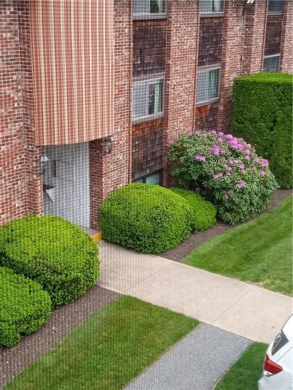 510 Child St Unit 106C, Warren, RI 02885 - property entrance featuring brick siding