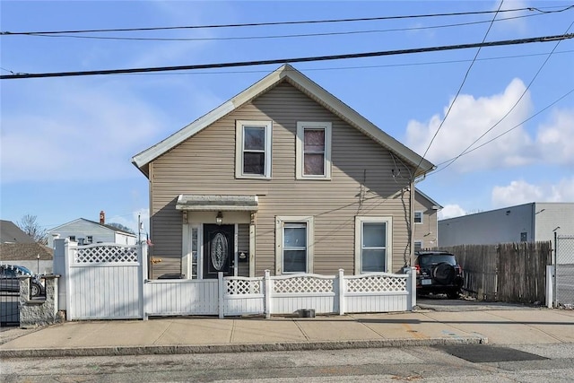 222 Pavilion Ave, Providence, RI 02905 - view of front facade with a fenced front yard