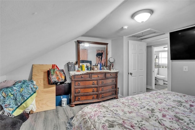 222 Pavilion Ave, Providence, RI 02905 - bedroom featuring wood finished floors, attic access, and lofted ceiling