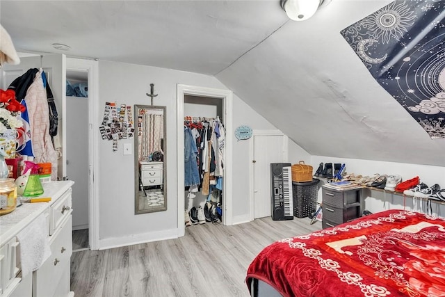 222 Pavilion Ave, Providence, RI 02905 - bedroom featuring light wood-type flooring and vaulted ceiling