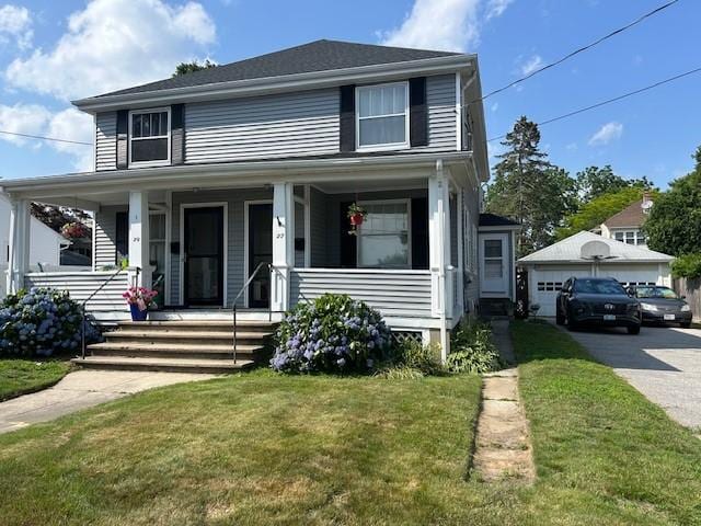 27 Highland St, Cranston, RI 02920 - view of front of house featuring a front lawn, a porch, and a garage