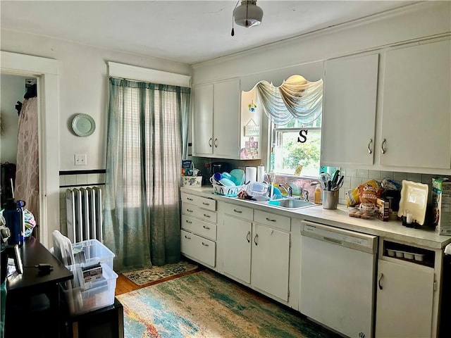 27 Highland St, Cranston, RI 02920 - kitchen featuring white dishwasher, radiator, light countertops, and white cabinets